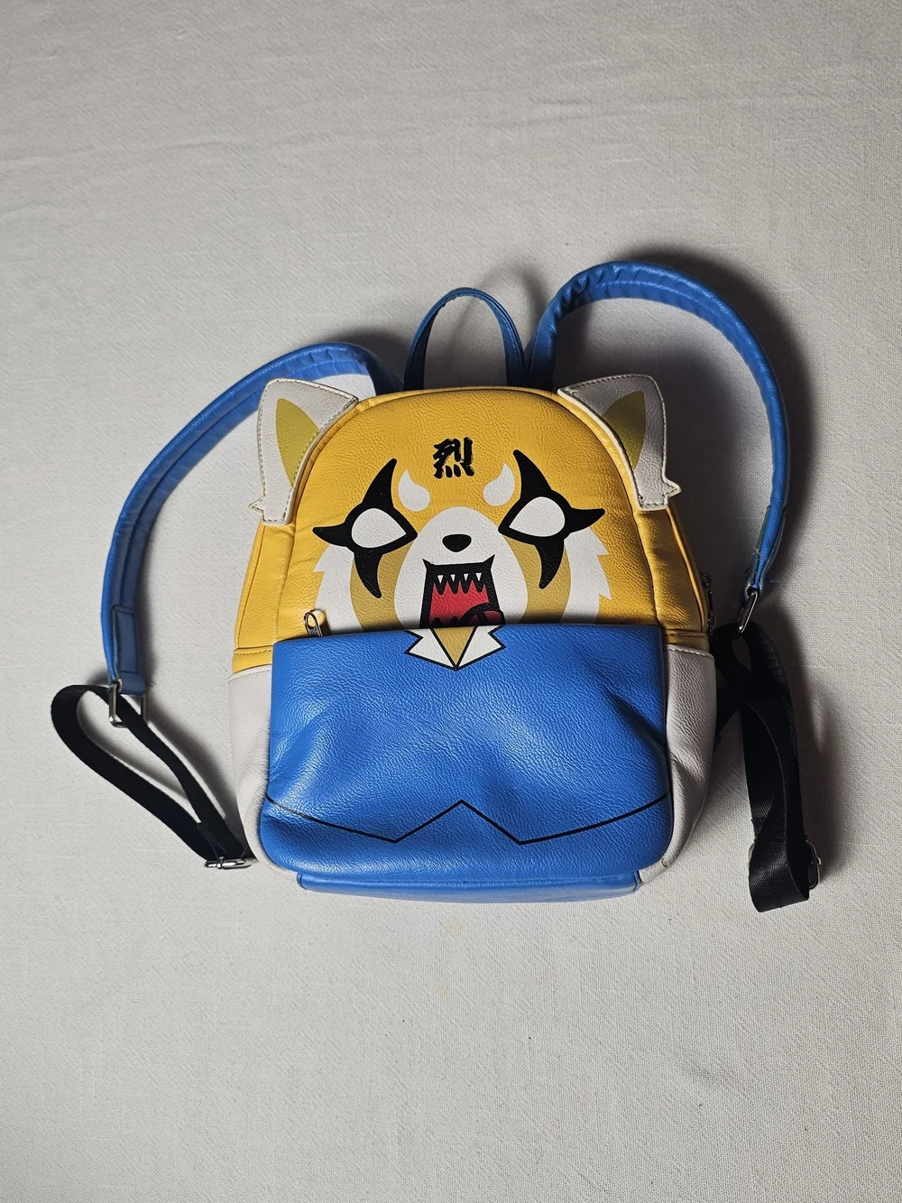 aggretsuko loungefly mini backpack Sanrio Retsuko Two Face Mini Backpack My name is Retsuko Loungefly aggretsuko mini backpack nwt
